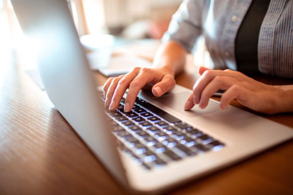 hotelier considering to use wix booking system on hotel website in laptop